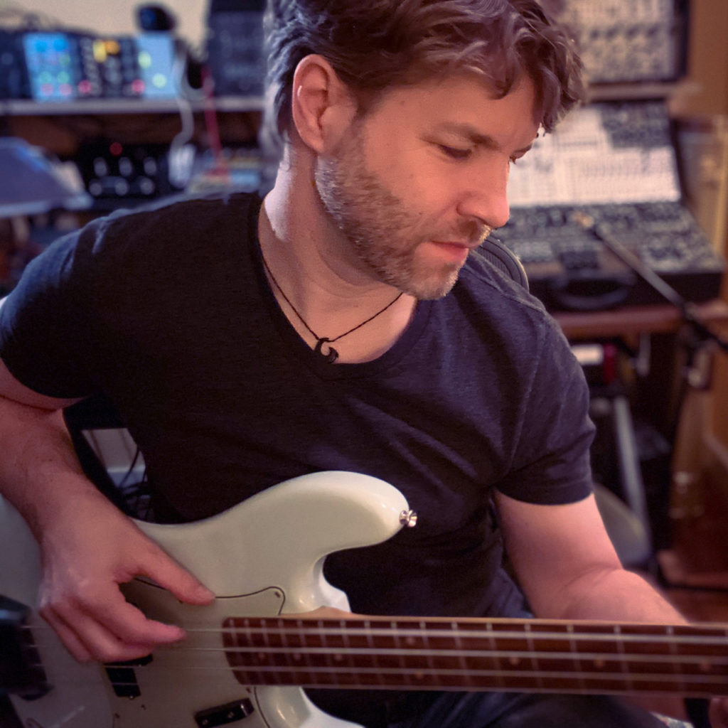 Thomas with bass guitar